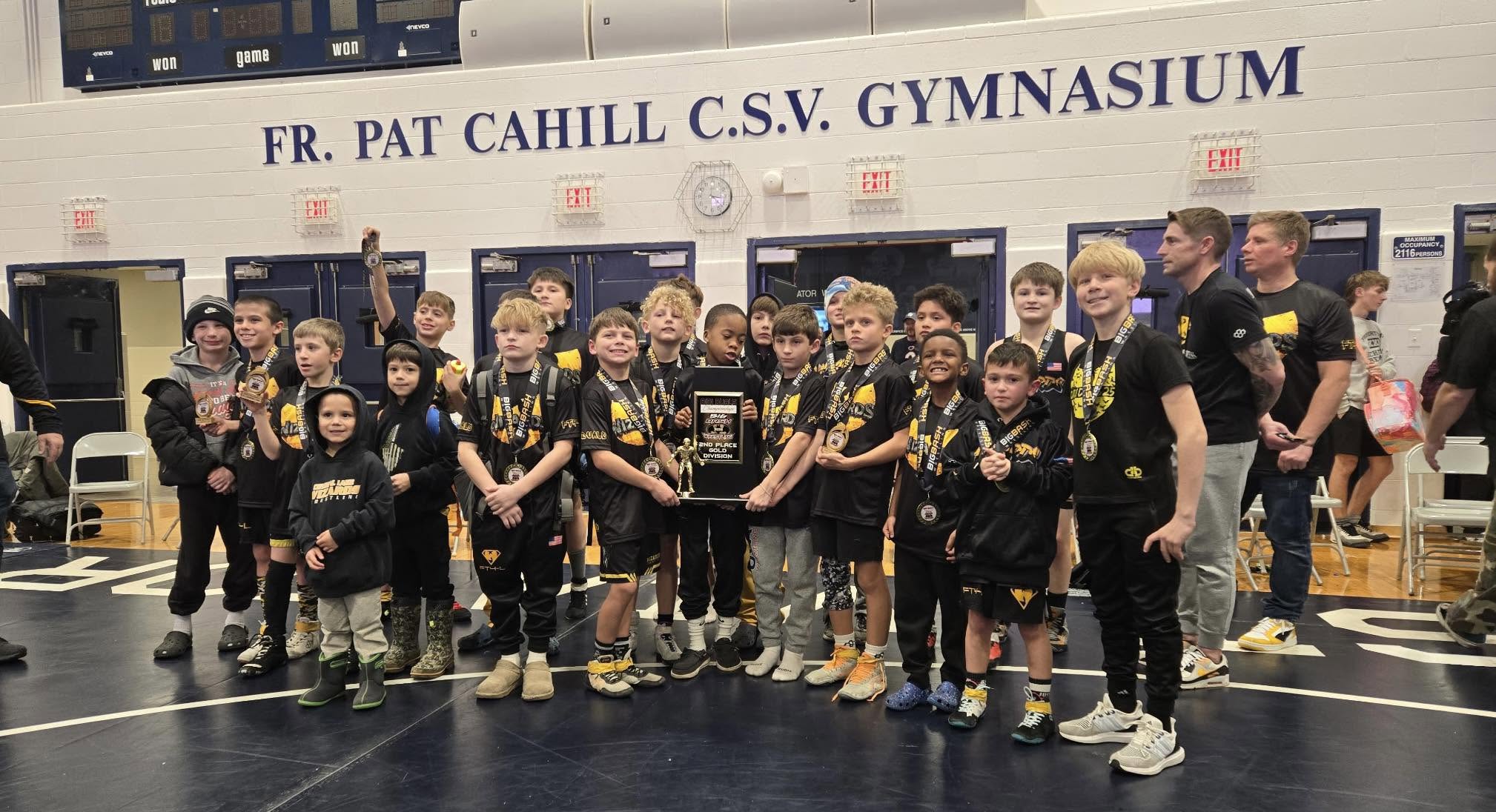Crystal Lake Wizards youth wrestlers celebrating a win